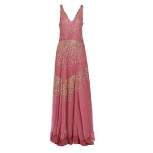 Perfect wedding guest dress! It is a rose colored gown with gold appliqué.